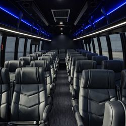 Metro Cars - NEW Executive Mini Bus, seats 35 passengers. Comfortable leather seating, aisle lighting, TV monitors, Bluetooth, USB ports, luggage space.
