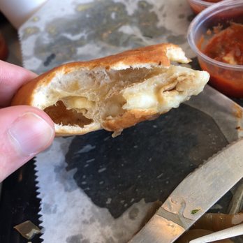 Noah's Grill & Pizza - a half eaten sandwich - Pizza Near Me - Dunn, North Carolina Noah's Grill & Pizza - a half eaten sandwich - Pizza Near Me - Dunn, North Carolina