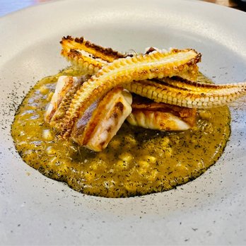 Allium - Perfectly cooked fish with grilled baby corn in a tomatillo sauce. - Mexican Near Me - Guadalajara, JAL