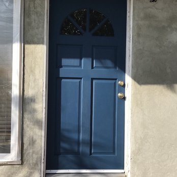 Correa Doors & Hardware - Before image of warped wooden door - Door Sales/Installation Near Me Correa Doors & Hardware - Before image of warped wooden door - Door Sales/Installation Near Me