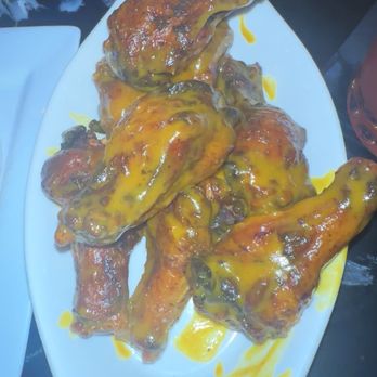 Noir Kitchen & Cocktails - Honey Gold Party Wings at NOIR. - Soul Food Near Me - Nashville, Tennessee Noir Kitchen & Cocktails - Honey Gold Party Wings at NOIR. - Soul Food Near Me - Nashville, Tennessee