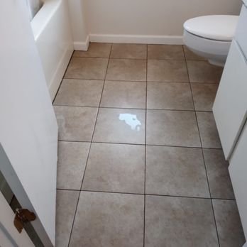 Double G Innovations - a bathroom with a toilet and tub - Insulation Installation Near Me Double G Innovations - a bathroom with a toilet and tub - Insulation Installation Near Me