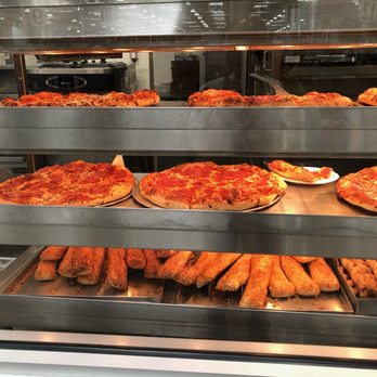 Costco Wholesale - Chicken bakes on the bottom tray. - Wholesale Stores Near Me - Niles, Illinois