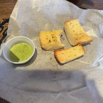 Mambo's Cafe - Buford - Garlic bread and spicy salsa verde - Peruvian Near Me - Buford, Georgia