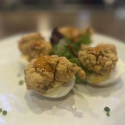 The Walrus Oyster & Ale House - Deviled eggs with fried oysters and smoky chipotle mayo.