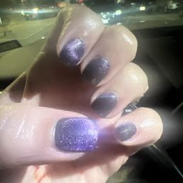 Black base coat with purple cat eye. Black base coat with purple cat eye.