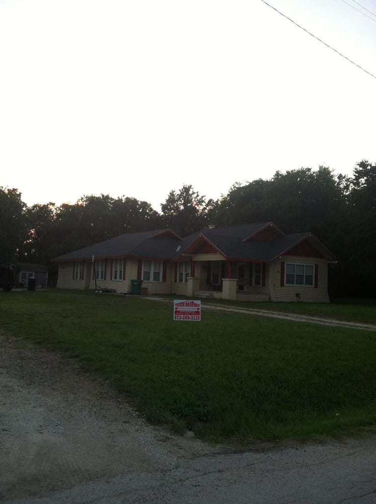 Slide of Tiger Roofing