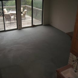 Rock Solid USA - unstained overlay in the living room - Flooring Near Me - Austin, Texas