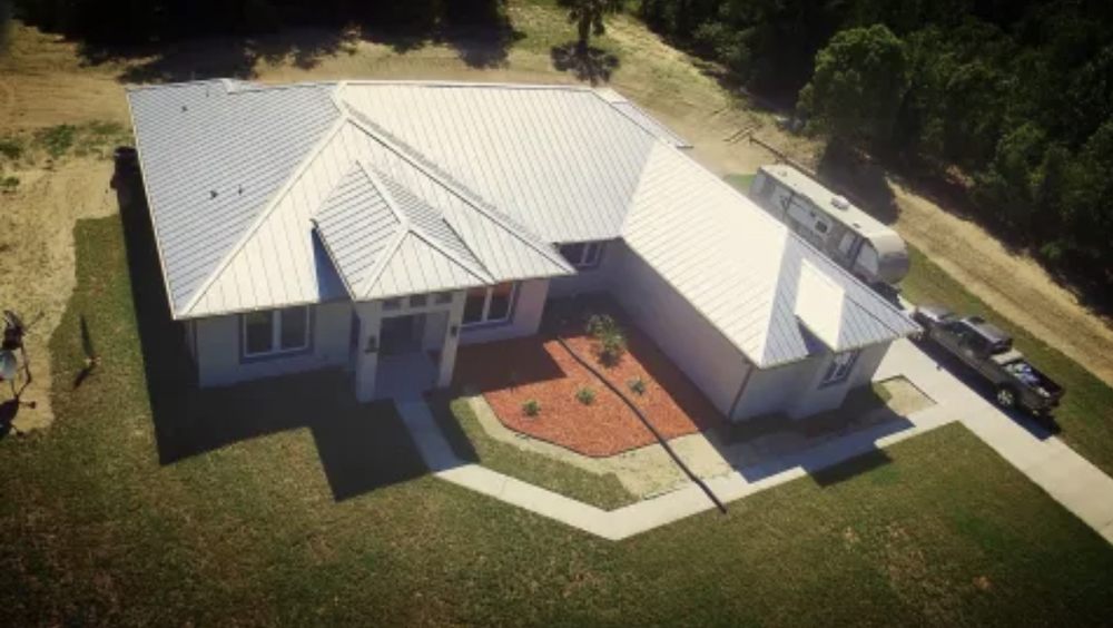 Slide of Chontas Roofing and Construction