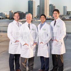 Orlando Hand Surgery Associates - Doctors from left to right: Brian White, George White, Anup Patel, Jason Pirozzolo.