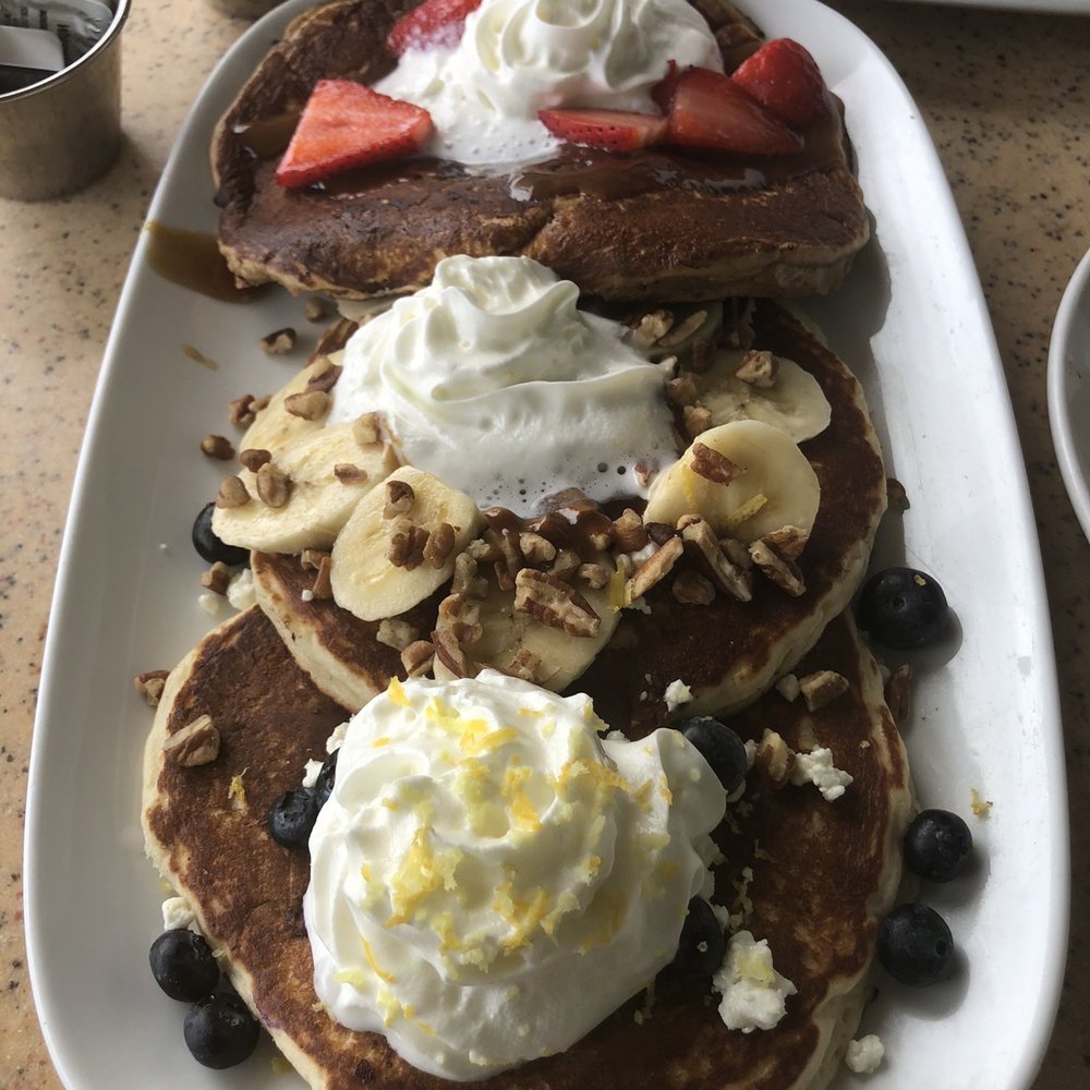 Another Broken Egg Cafe - Pancake Flight Trio (Ipanema, Bananas Foster & Lemon-Blueberry Goat cheese). Best pancakes EVER! - Breakfast & Brunch Near Me - Delray Beach, Florida Another Broken Egg Cafe - Pancake Flight Trio (Ipanema, Bananas Foster & Lemon-Blueberry Goat cheese). Best pancakes EVER! - Breakfast & Brunch Near Me - Delray Beach, Florida
