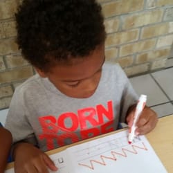 Lighthouse Preschool & Daycare - Practicing writing our letters & numbers