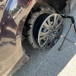 Mavis Discount Tire - The shredded tire, pre-Mavis.