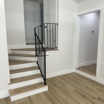 Metal Solutions Ironworks - Interior stair railing, matte black, tricky angle with minimal posts - Fences & Gates Near Me Metal Solutions Ironworks - Interior stair railing, matte black, tricky angle with minimal posts - Fences & Gates Near Me