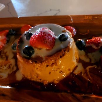 Los Agaves - Flan with strawberry garnish - Bars Near Me - Goleta, California Los Agaves - Flan with strawberry garnish - Bars Near Me - Goleta, California