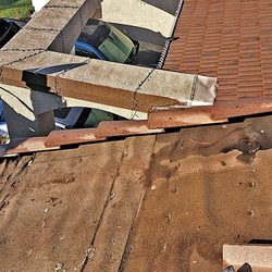 Weathertight Roofing - Damaged roof repaired by Weathertight Roofing Company Inc.Hemet,California