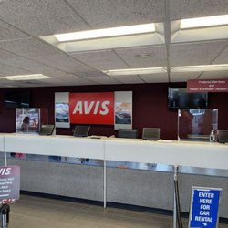Avis Rent A Car - Empty. Only one person working and she's doing her best.