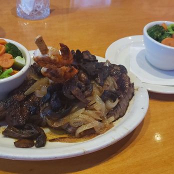 Texas Roadhouse - Ribeye smothered in mushrooms and onions with fresh steamed vegetables - Steakhouses Near Me - Lake Park, Florida Texas Roadhouse - Ribeye smothered in mushrooms and onions with fresh steamed vegetables - Steakhouses Near Me - Lake Park, Florida