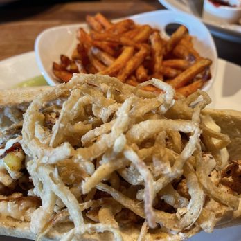 Yard House - House Chicken Cheesesteak with sweet potato fries - New American Near Me - Bakersfield, California