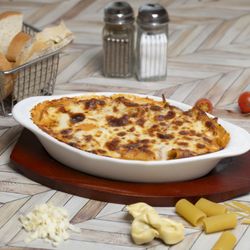 Pastaloni - Combinazione
3 types of pasta covered in Bolognese sauce and topped with mozzarella cheese, baked in the over (el forno) 
Deliziosa!