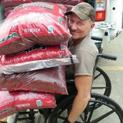 Brookway Market Basket - Joey moving the mulch....