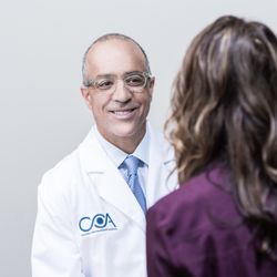 Columbus Ophthalmology Associates - Dr. Derick consulting with patient
