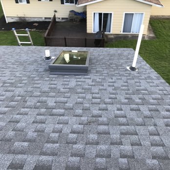 NAM Contracting - Roof Replacement with new skylight - Roofing Near Me NAM Contracting - Roof Replacement with new skylight - Roofing Near Me