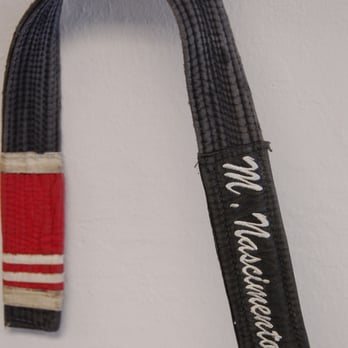 Marco Nascimento - Marco is a third degree black belt. This belt was worn when Marco was a second. - Brazilian Jiu-jitsu Near Me - San Mateo, California Marco Nascimento - Marco is a third degree black belt. This belt was worn when Marco was a second. - Brazilian Jiu-jitsu Near Me - San Mateo, California
