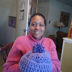 Classes Offered In Aston - Lauren crocheted with hat with pompom.