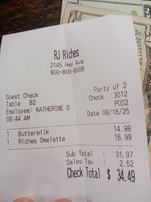 R J Riches by null