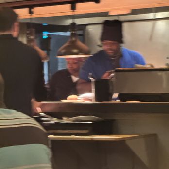 Barnsider - cook using cell phone while handling food. - Steakhouses Near Me - Albany, New York