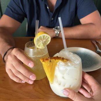 Postcards Restaurant - take a hike (left) + old san juan pins colada (right) - Seafood Near Me - Hanalei, Hawaii