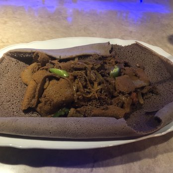 Shewa Ber - Firfir with Tibs. Amazing combo of beef, tomato and injera. Just the best things. - Ethiopian Near Me - Seattle, Washington Shewa Ber - Firfir with Tibs. Amazing combo of beef, tomato and injera. Just the best things. - Ethiopian Near Me - Seattle, Washington