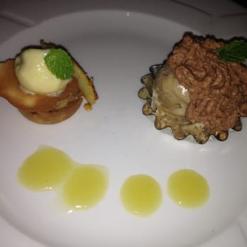 Mezzaluna - Caramel Apple Galette with Housemade Vanilla Bean Ice Cream and cigar flavored ice cream - New American Near Me - Fargo, North Dakota Mezzaluna - Caramel Apple Galette with Housemade Vanilla Bean Ice Cream and cigar flavored ice cream - New American Near Me - Fargo, North Dakota