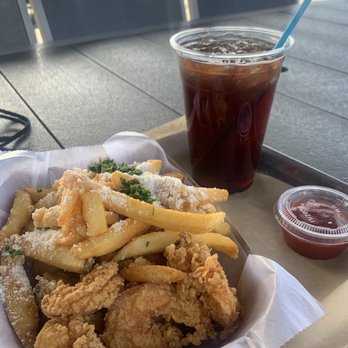 Big Ray's Fish Camp & Grille Riverwalk - Shrimp Basket with garlic parmesan fries and sweet tea is hitting the spot - Seafood Near Me - Tampa, Florida