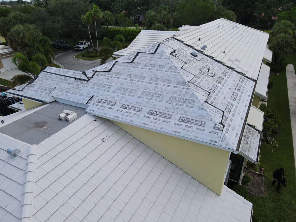 Slide of Elite Tech Roofing