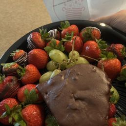 A strawberry platter with an extra pineapple "heart"