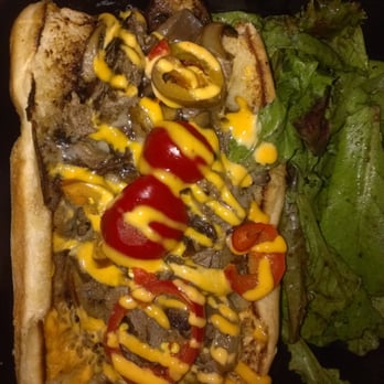 Devilicious - The ribeye philly that I want to never end. Every bite is happiness. - New American Near Me Devilicious - The ribeye philly that I want to never end. Every bite is happiness. - New American Near Me