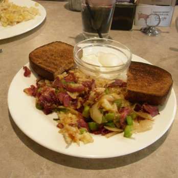 Charles & Darl's - Smoked Corned Beef Hash and Eggs.  Spot the cheesy potatoes. - Barbeque Near Me - Augusta, Michigan