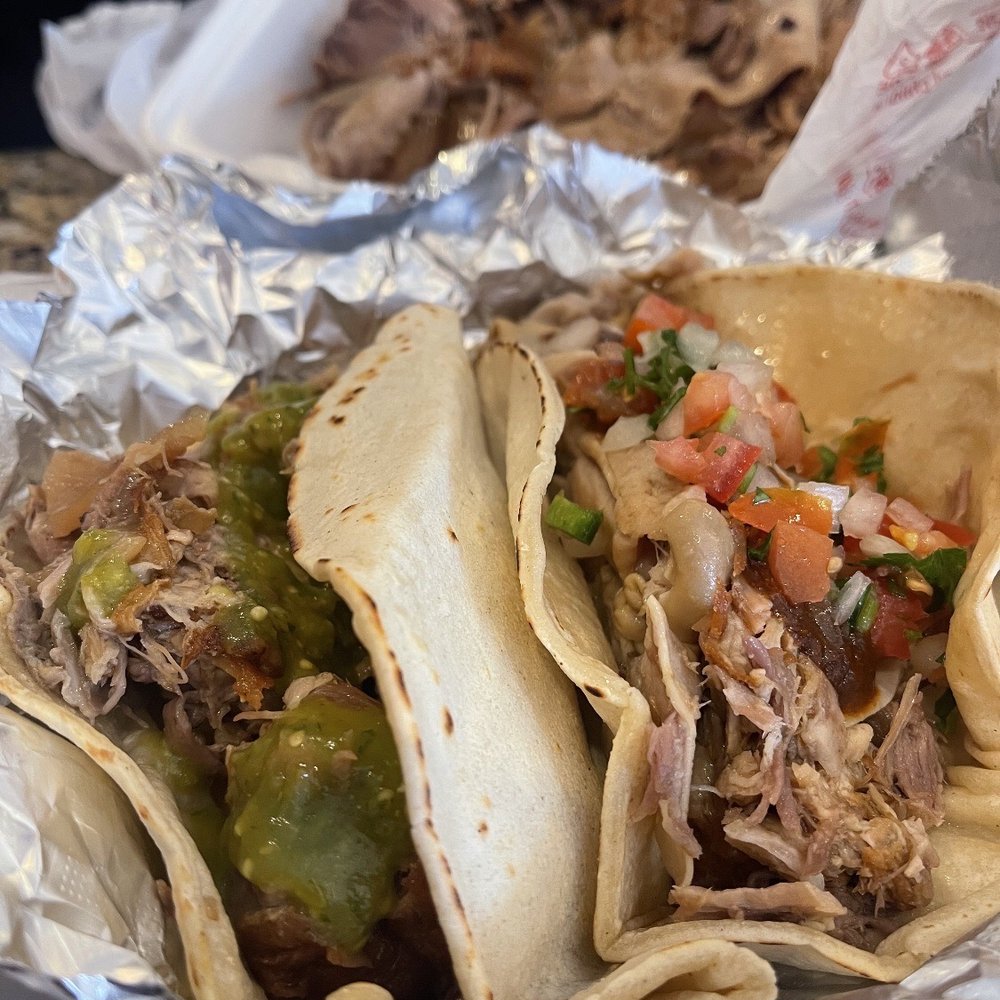 Carnitas El Rey - The massive tacos and 2lbs of carnitas in the background - Tacos Near Me - Oxnard, California Carnitas El Rey - The massive tacos and 2lbs of carnitas in the background - Tacos Near Me - Oxnard, California