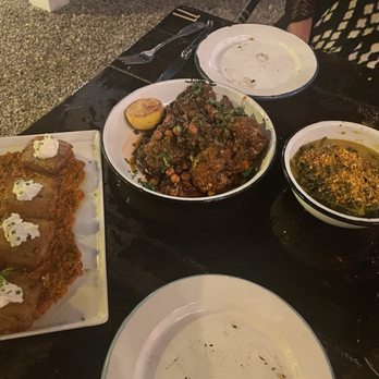 Lost Isle - Grit cakes, cauliflower steak and greens - Cocktail Bars Near Me - Johns Island, South Carolina