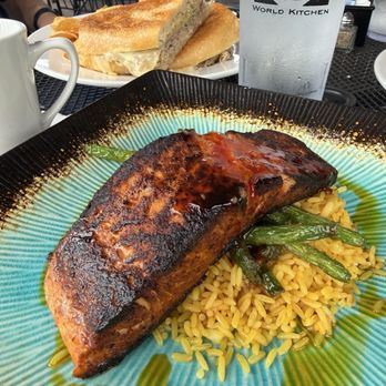 Ricos World Kitchen - Blackened salmon on saffron rice with green beans - New American Near Me - Buford, Georgia Ricos World Kitchen - Blackened salmon on saffron rice with green beans - New American Near Me - Buford, Georgia