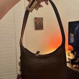 My cute little brown Coach Glove Curve Zip Bag My cute little brown Coach Glove Curve Zip Bag