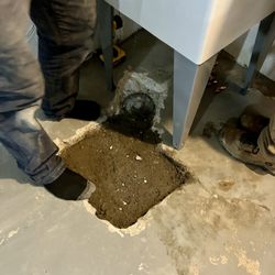 Drains Unlimited - Exposing the main drain clean out cap