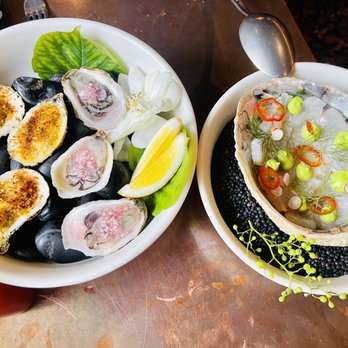 Cella Restaurant & Bar - 3 Oysters Rockefeller & 3 raw oysters with a champagne mignonette & fresh lemon. Halibut crudo served in an abalone shell. - New American Near Me - Monterey, California
