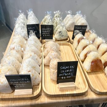 Nana's Green Tea - Onirigi are triangle shaped rice with a 7 variety of fillings like salmon ikura, tuna mayo, chicken karaage & vegan $4.5-6 - Desserts Near Me - Bellevue, Washington