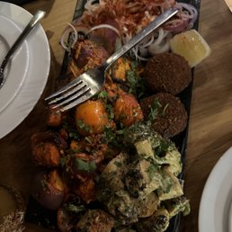 Vegetarian platter with Chaapas, paneer, and veggies