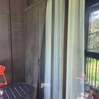 Riverhouse Lodge - Damaged screen door just left outside the balcony with cobwebs on the ceiling. - Hotels Near Me - Bend, Oregon Riverhouse Lodge - Damaged screen door just left outside the balcony with cobwebs on the ceiling. - Hotels Near Me - Bend, Oregon