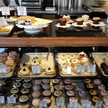 Cupcake Royale - What a gorgeous display case! - Bakeries Near Me - Seattle, Washington