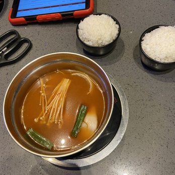 KPOT Korean BBQ & Hot Pot - Seafood Tom yum and two sides of rice - Korean Near Me - Kearny, New Jersey KPOT Korean BBQ & Hot Pot - Seafood Tom yum and two sides of rice - Korean Near Me - Kearny, New Jersey